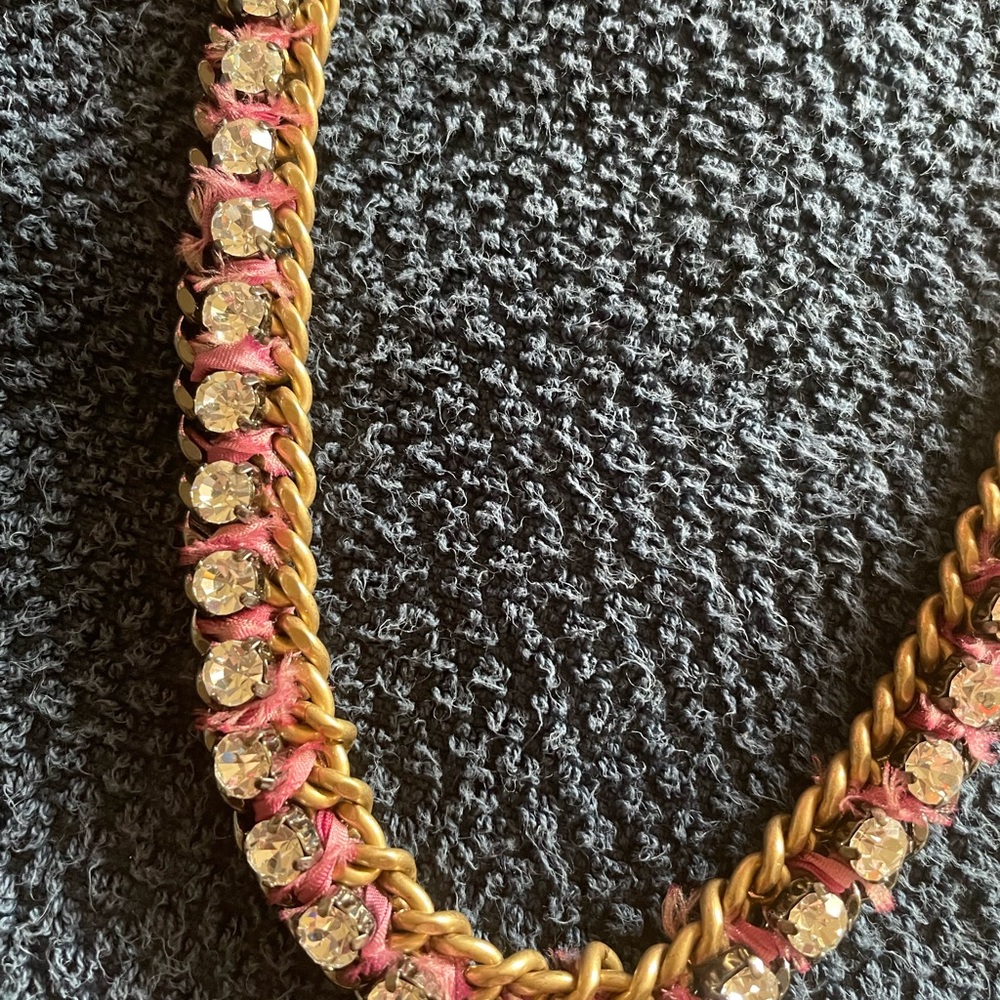 Lovely long chained necklace, with a pink silk ribbon.Great condition.